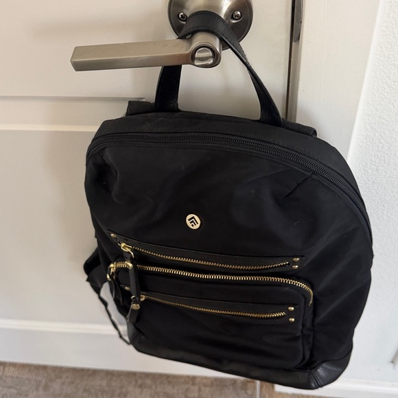 Black Backpack with Gold Accents.. Nylon - Picture 3 of 3